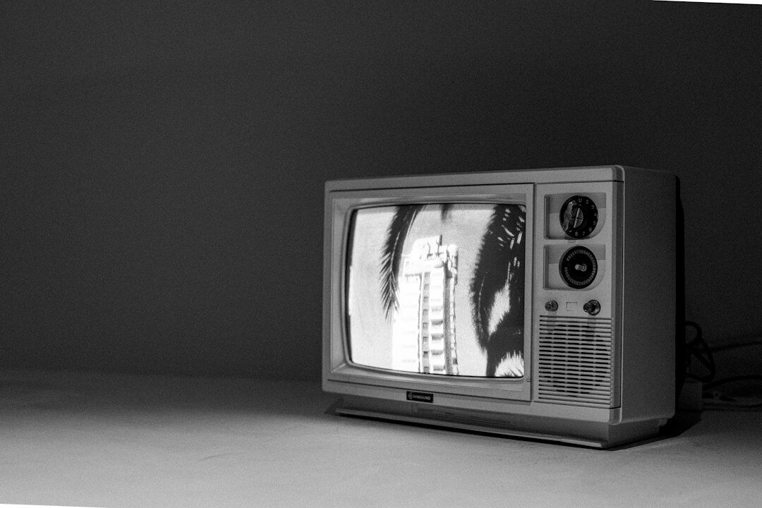 person watching old tv